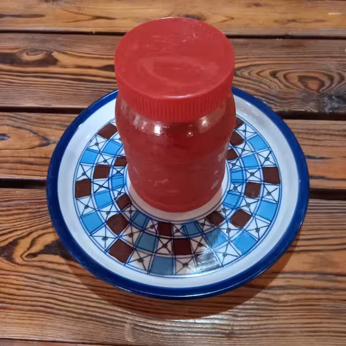 رب گوجه 800 گرمی  مزرعه گردشگری کشاورزی تاجر سریزدی