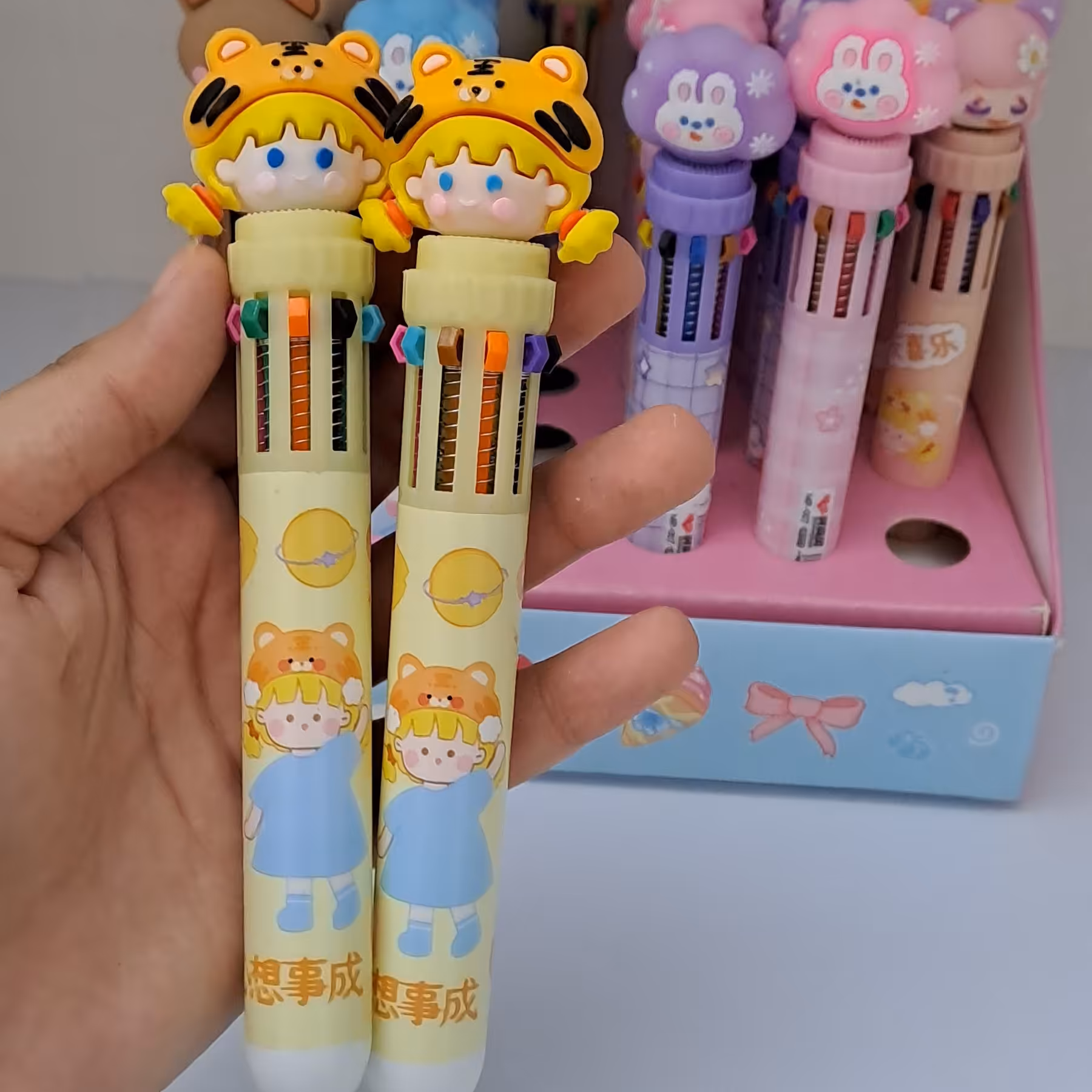 خودکار ده رنگ فشاری دخترک موطلایی(یک عدد)