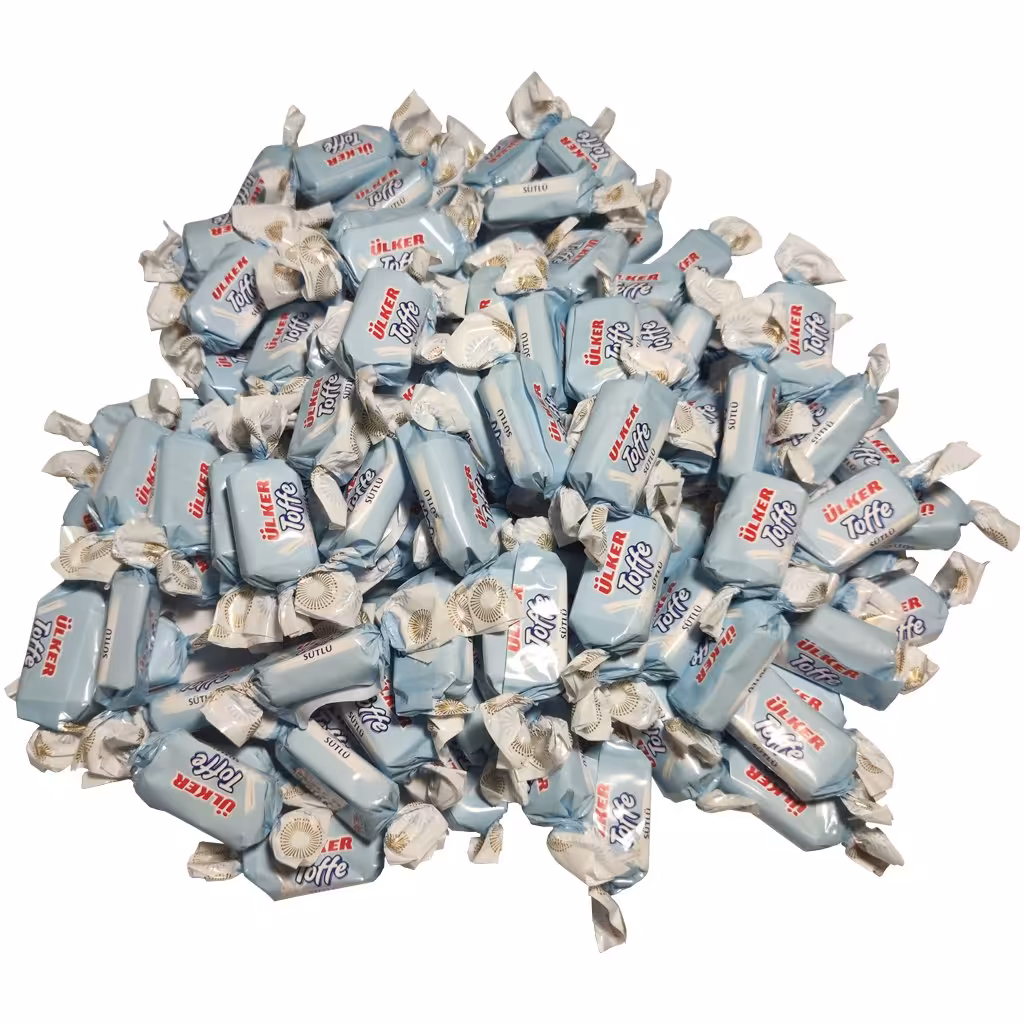 تافی ترکیه‌ای ÜLKER با طعم شیر در بسته بندی های 500 گرمی. با میزان شیرینی ملایم و طعم شیری. طعمی به یاد ماندنی