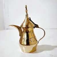 دله عربی برنجی دله برنجی دله برنزی قهوه جوش برنجی با ارتفاع 14 سانتیمتر قهوه جوش برنزی 