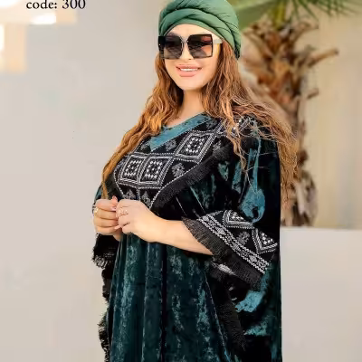 مانتو مجلسی مخمل آینه ای تا سایز 56 مدل کفتان دلیناز کالکشن عید 1403