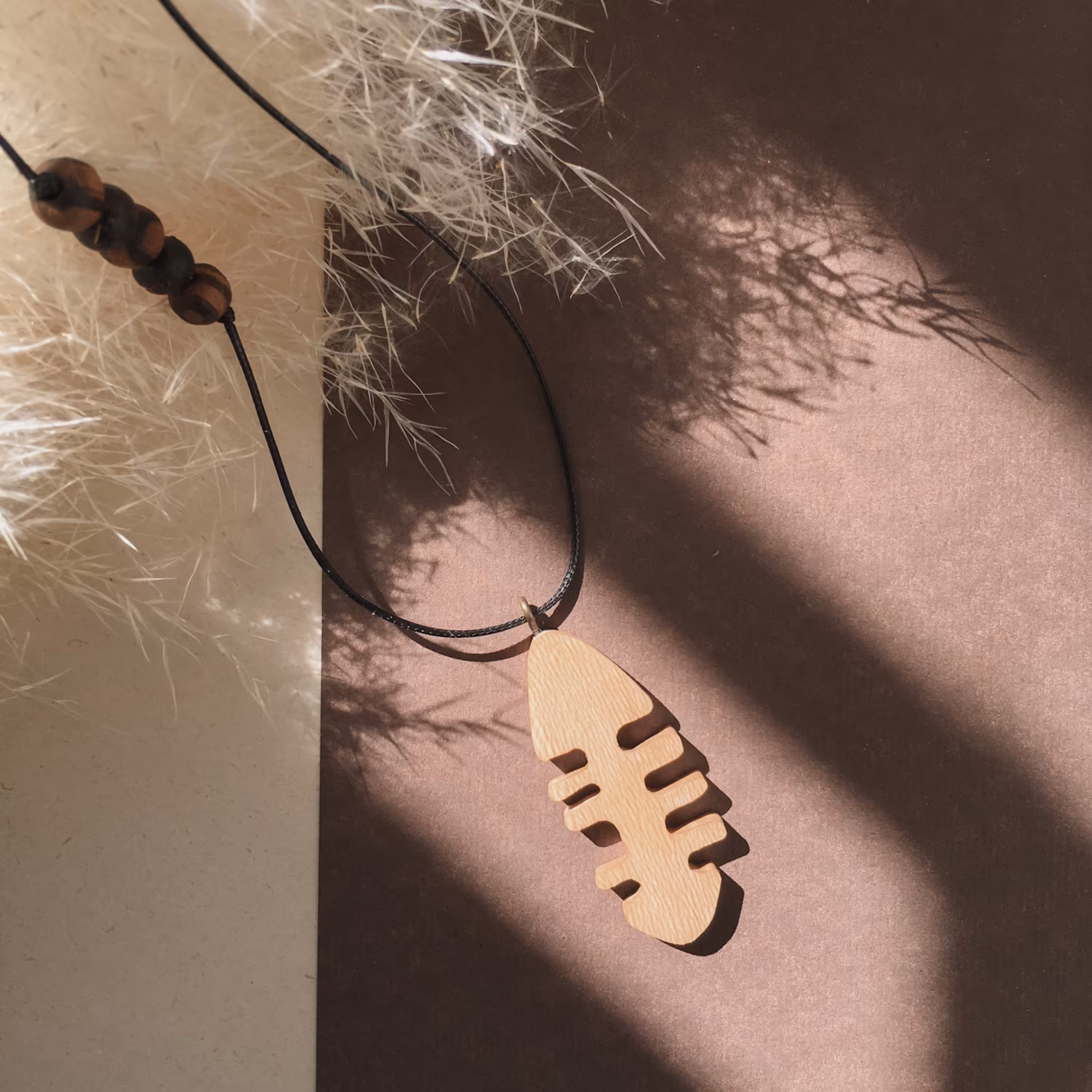 گردنبند چوبی اسکلت ماهی