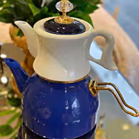 کتری و قوری لعابی چینی
برند Duffy ترک
کتری لعابی ، قوری چینی 
دستگیره استیل آبکاری شده
هزینه ارسال به عهده مشتری