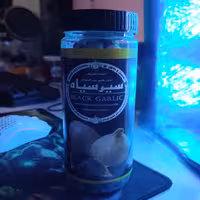 سیر سیاه قوطی 200 گرمی خالص(پک 5 عددی) (فراوری شده از سیر همدان)