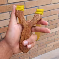 تیرکمان  سنگی چوبی با کش لاتکس مخصوص رشته  تیراندازی  و چرم گاومیش 