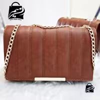 کیف آیناز چرم عسلی . بسیار با کیفیت . بند تمام زنجیر  مرغوب