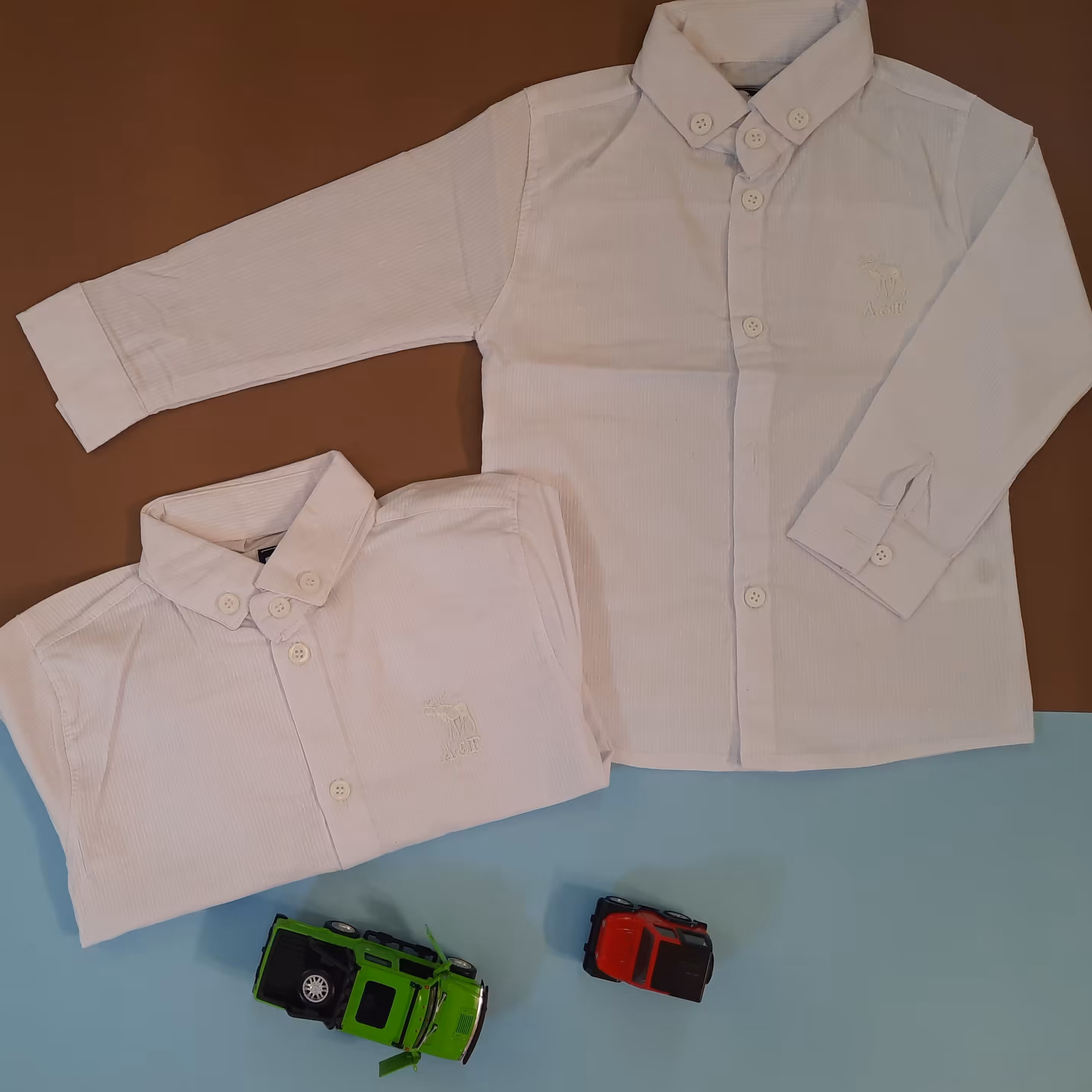 پیراهن پسرانه جلو دکمه رنگ سفیدموجودی سایز 40