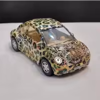 ماکت ماشین کلکسیونی فولکس واگن بیتل با نقاشی پلنگ مقیاس 1.32