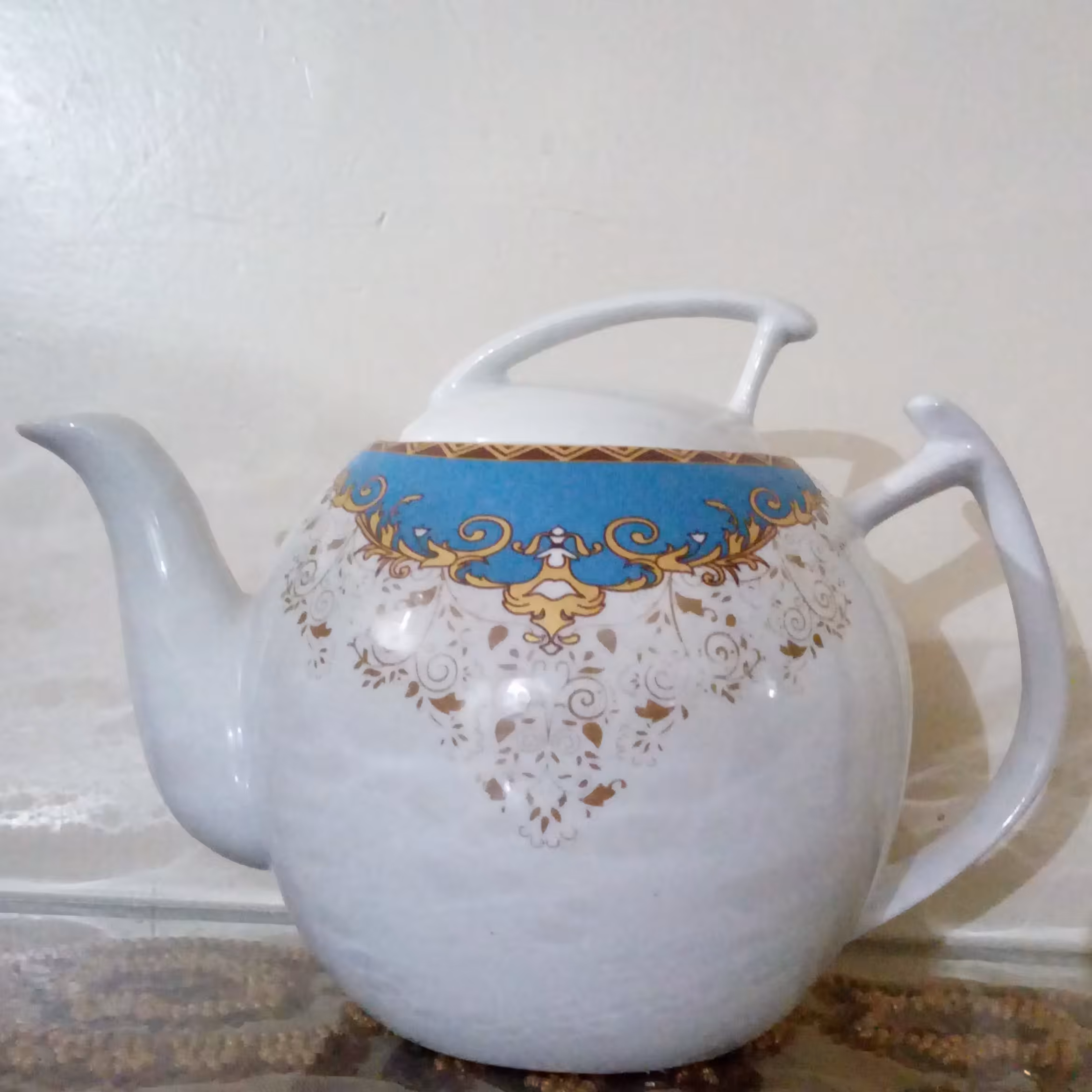 قوری توپی حاشیه فیروزه ای