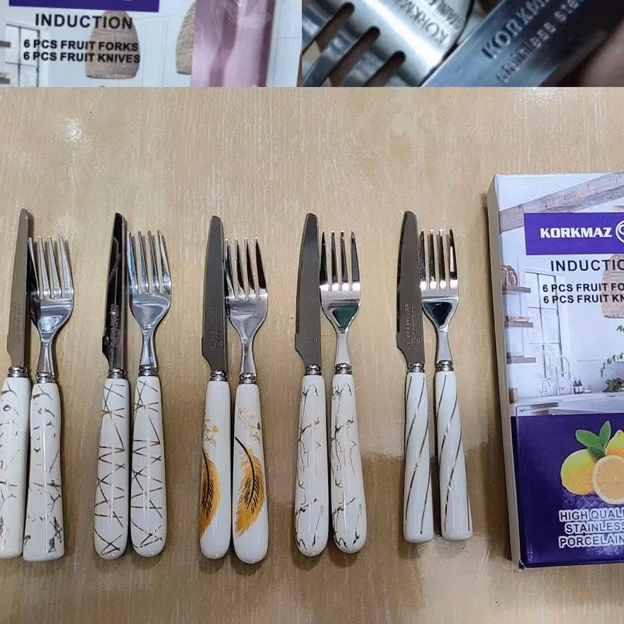 کارد چنگال سرامیکی KORKMAZ 
هر بسته شامل 6عدد کارد 6عدد چنگال
حک شده،طراحی دسته شیک پر فروش 
جنس استیل،تیغه تیز،با کیف