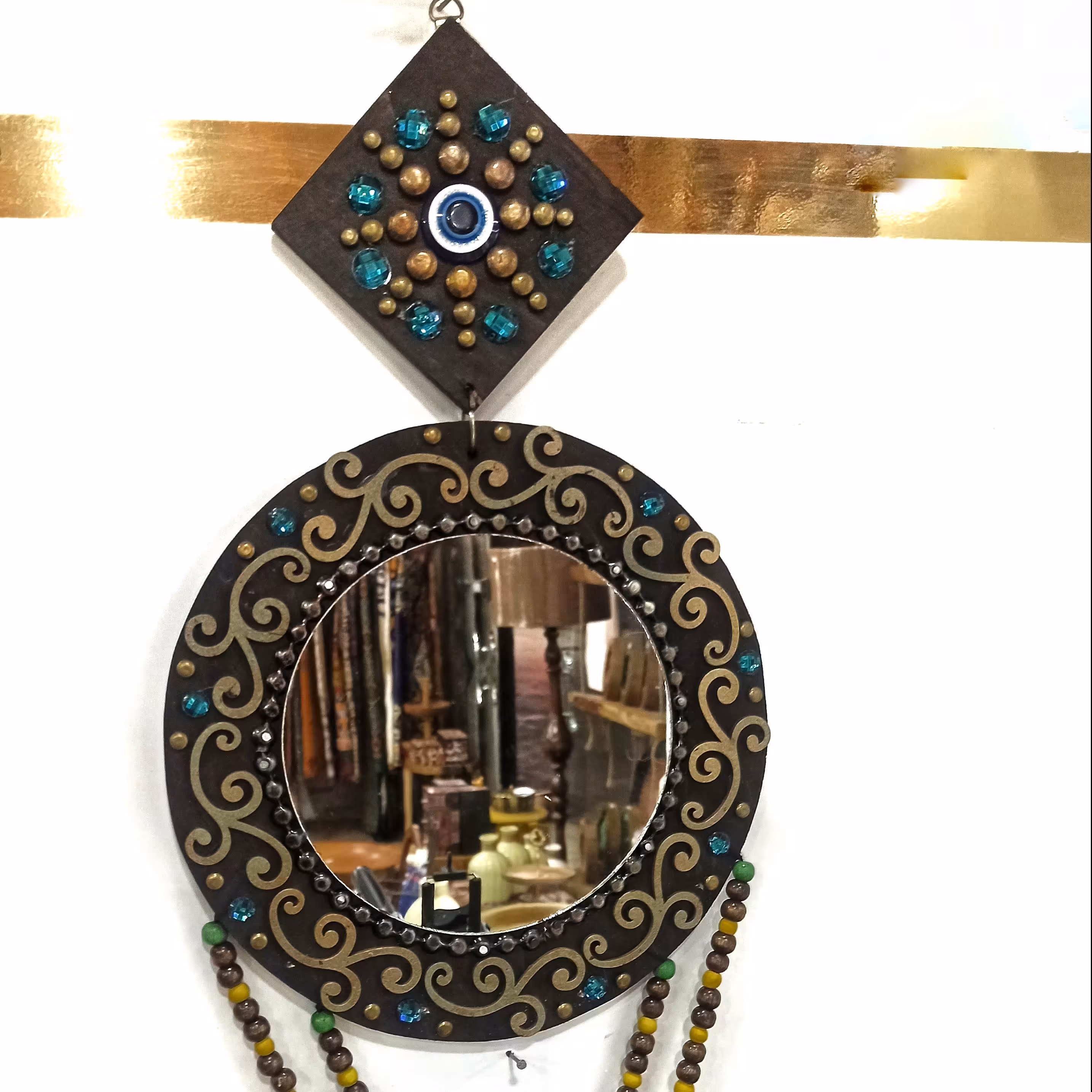 آینه دیواری چوبی چشم نظر دار دستساز