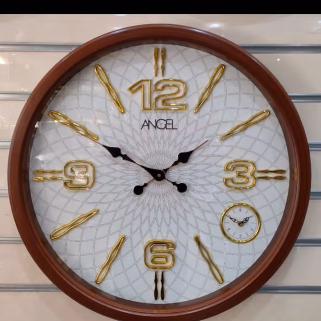 ساعت مدل انجل  شماره ابکاری شده  قطر 70سانتی متر رنگ بندی جور سفید طوسی  گردویی ارسال باتیپاکس هزینه بامشتری درب منزل 
