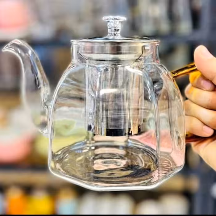 قوری پیرکس شعله مستقیم طرح لوزی الماسی دسته طلایی عسلی حجم 600 میل با کیفیت عالی دارای صافی استیل