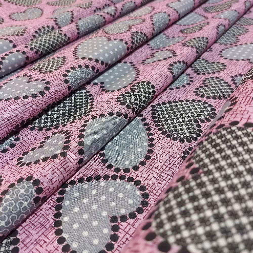 پارچه ملحفه ای طرح قلب پدیده نو صورتی ملحفه سرای رزاق