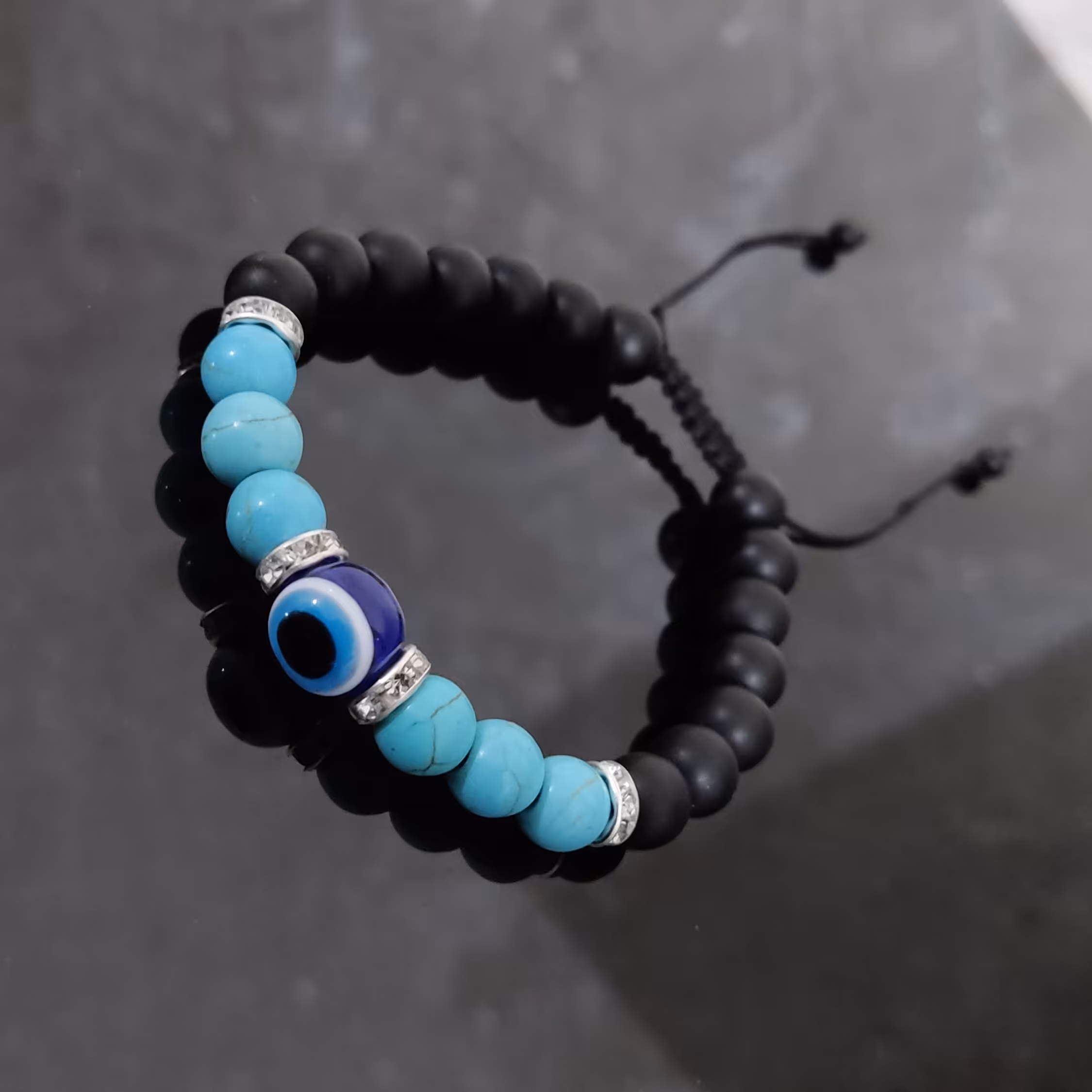 دستبند سنگ اونیکس مشکی مات و فیروزه طرح چشم نظر مردانه و زنانه 