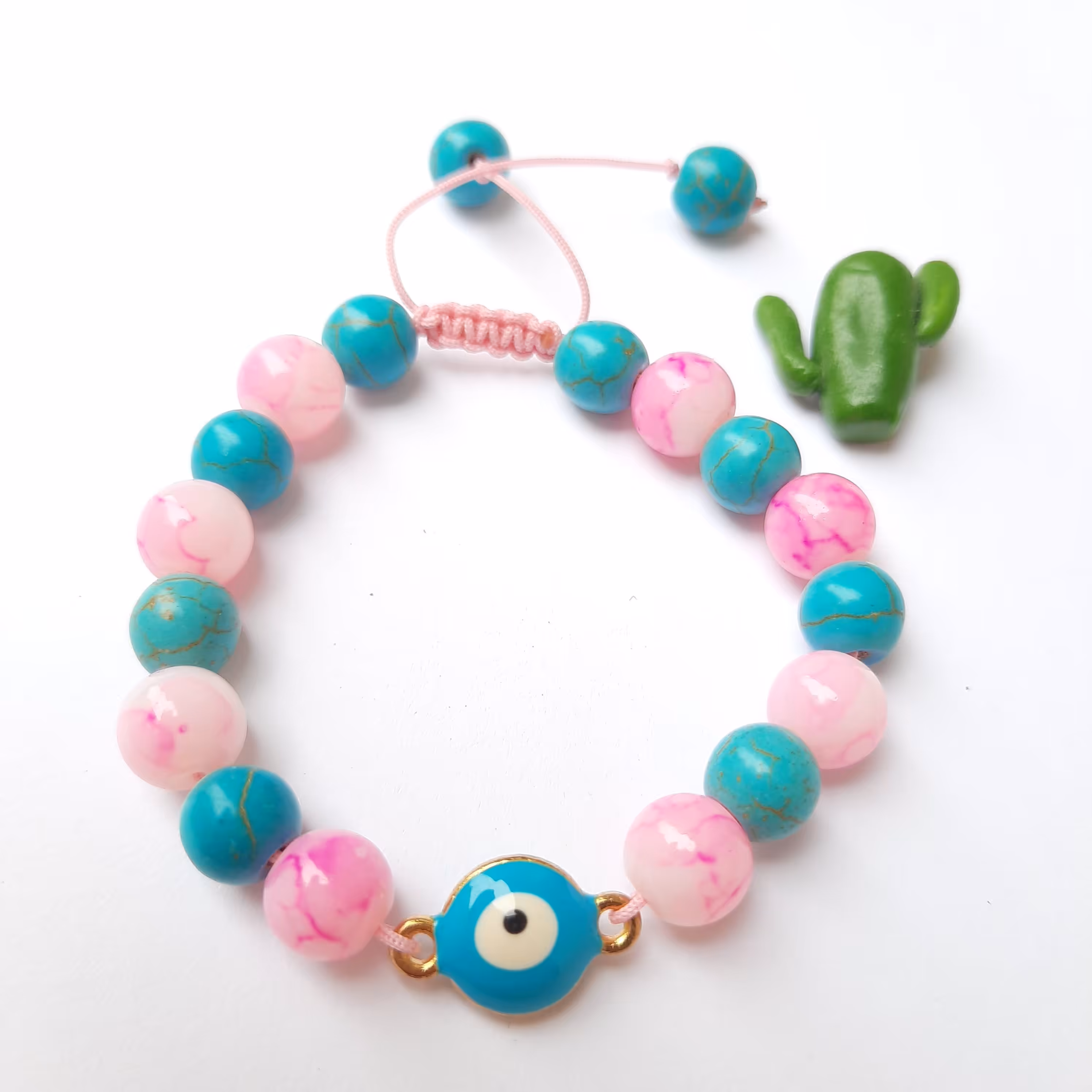 دستبند  سنگ فیروزه و صورتی پلاک دار(طرح چشم نظر)