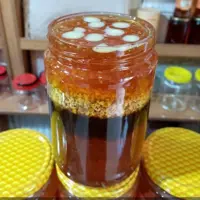 عسل وگرده گل و ژل رویال 1 کیلویی (نه نه کوکب)