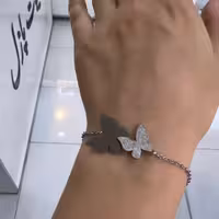 دستبند - جنس استیل - طرح ظریف - مدل پروانه جفت - رنگ ثابت - ضد حساسیت -ارسال رایگان