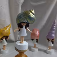 مجسمه دختر صدفی در 4 طرح