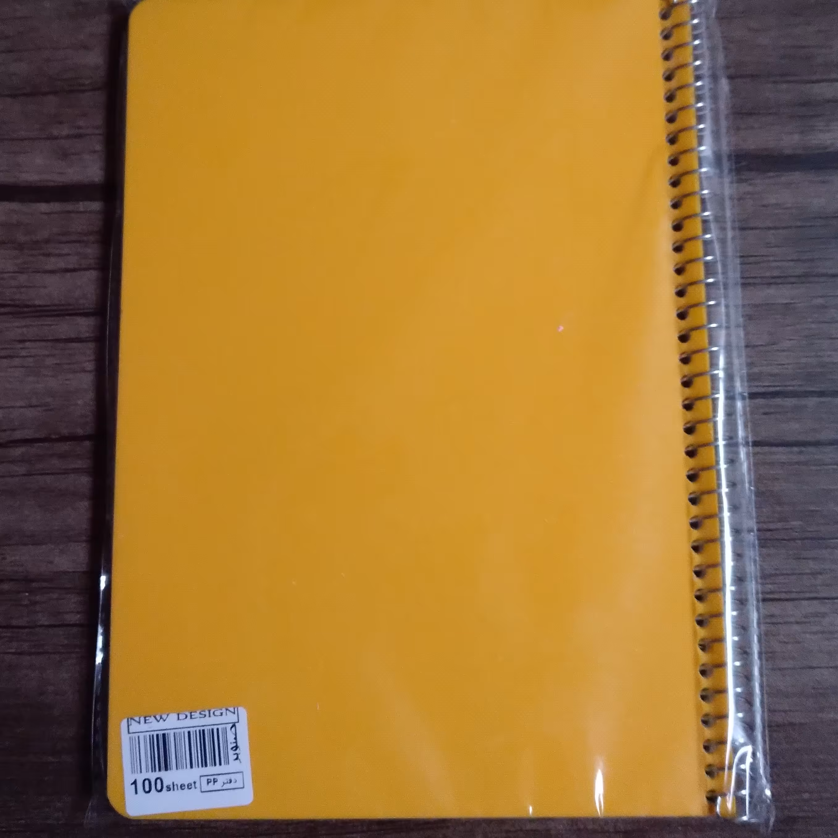 دفتر مشق 100 برگ سیمی صنوبر رنگ پرتقالی جلد طلقی