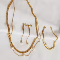 اکسسوری دخترانه زیورآلات دخترانه و زنانه استیل نیم ست زنانه ست زنانه کارتیر نیم ست مروارید دستیند دخترانه مروارید 