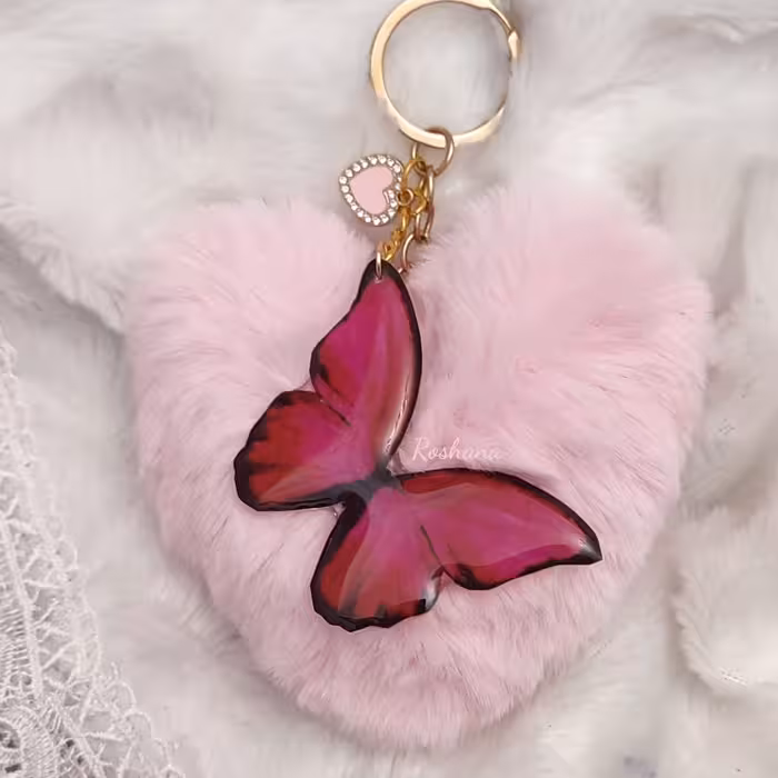 جاکلید  پروانه رزینی همراه پوم پوم