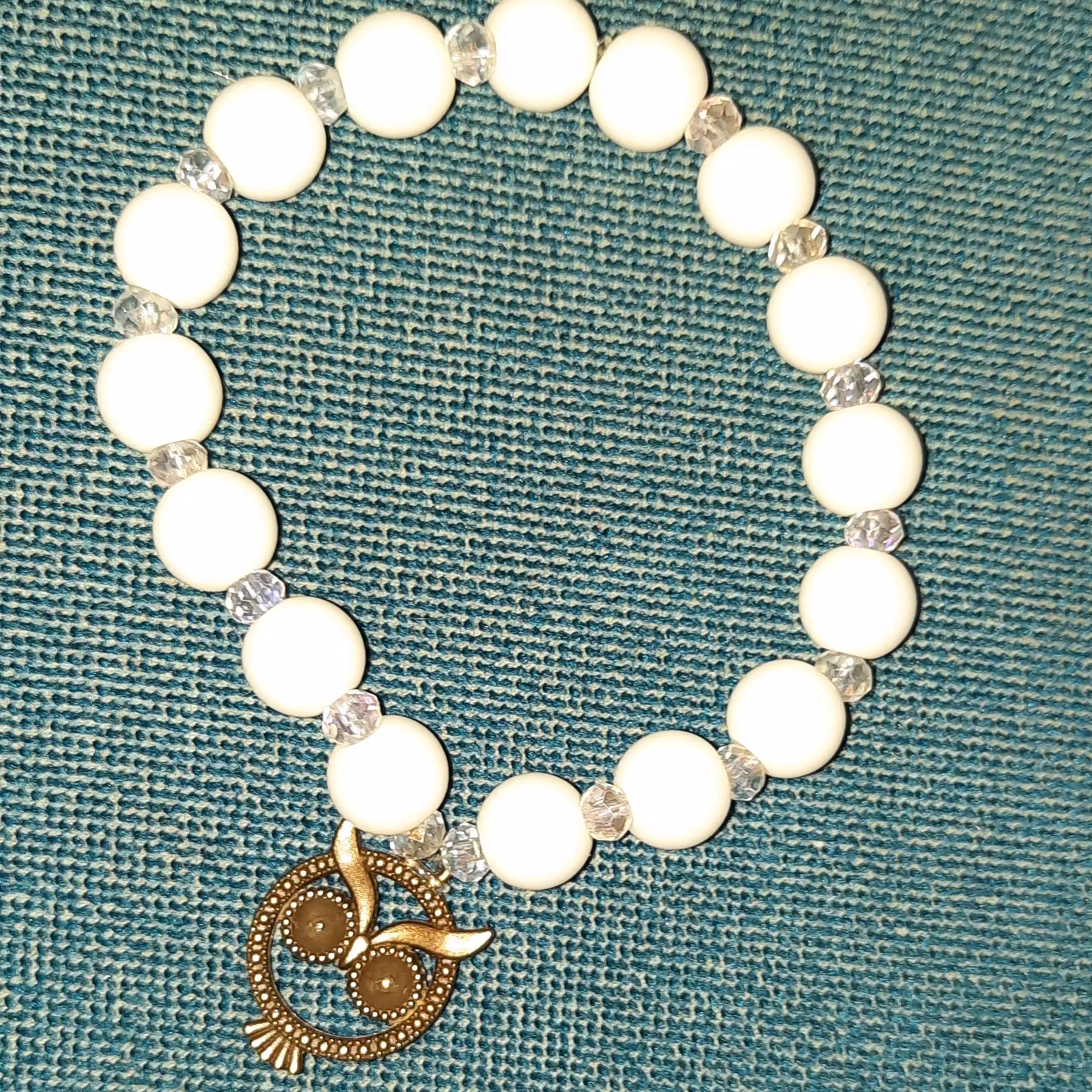 دستبند کشی آویزدار کشی اونیکس در رنگهای سیاه و سفید 