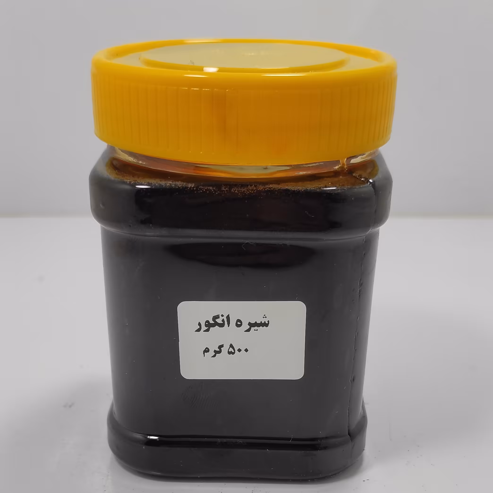 شیره انگور سیاه محلی و خالص پک 12 تایی عمده (500 گرمی)
