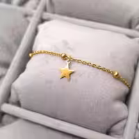 دستبند ظریف و جذاب با زنجیر توپی و اویز ستاره