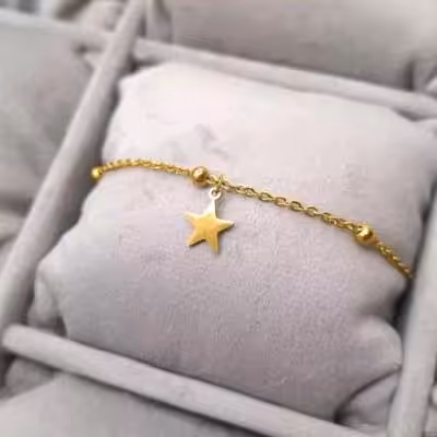 دستبند ظریف و جذاب با زنجیر توپی و اویز ستاره