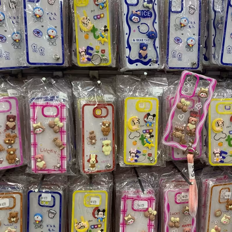 قاب گوشی موبایل عروسکی برجسته مدل سامسونگ و اپل با جای بند 