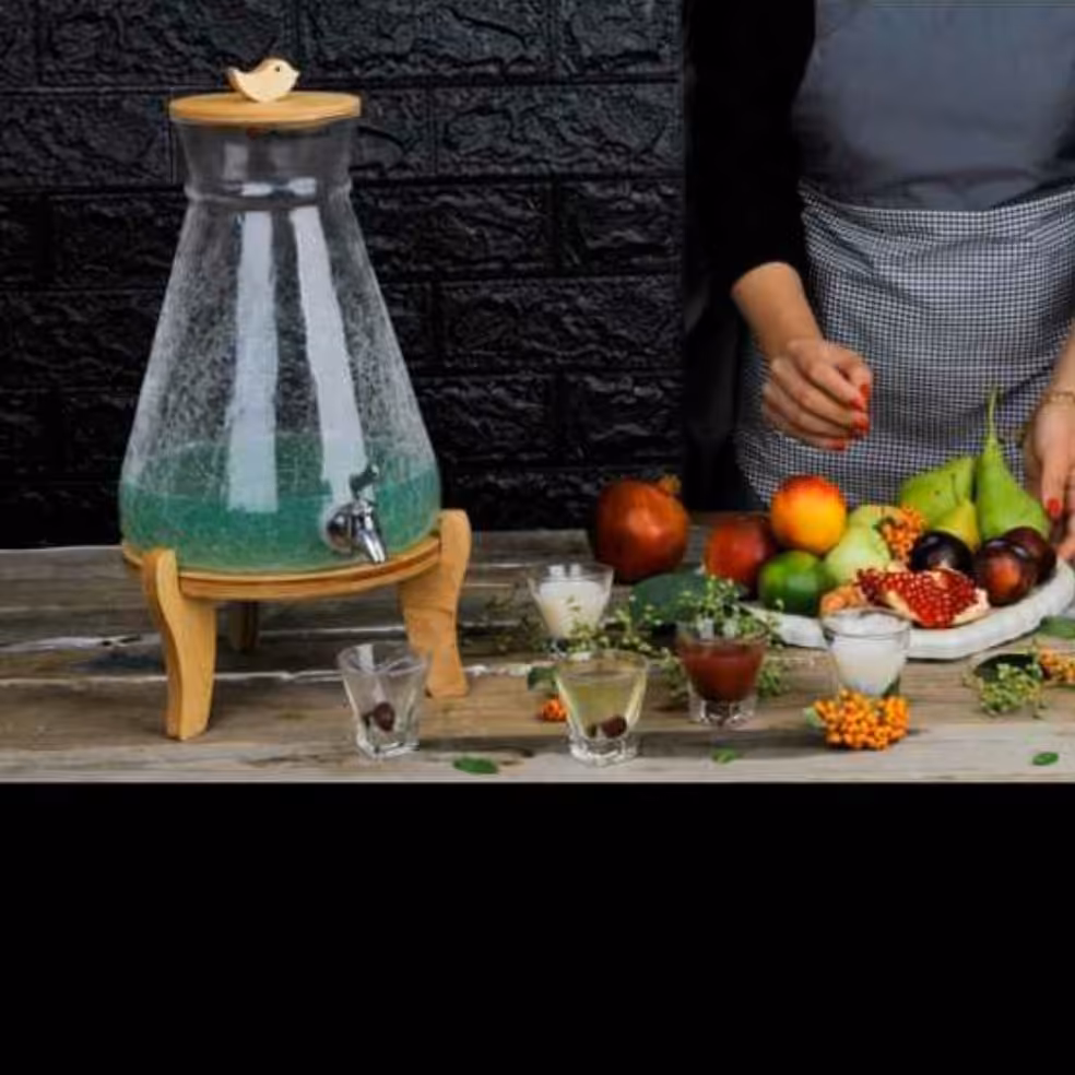 کلمن شیشه ای مدل کوزه(هزینه  ارسال به عهده مشتری میباشد)