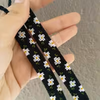 دستبند دوستی طرح شکوفه گل( محصول کاملا دستباف )           