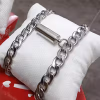 دستبند مگنتی ست زوج کارتیر دستبند آهنربایی استیل نقره ای مگنت استوانه ای