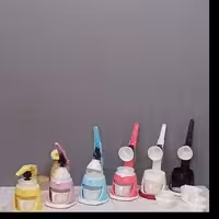 آبمیوه گیری یونیهوم دستی آب مرکبات گیری اهرمی دستی رنگی دارای لیوان وجعبه کادوی 