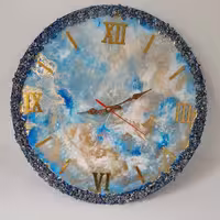 ساعت دیواری رزینی طرح ابروباد