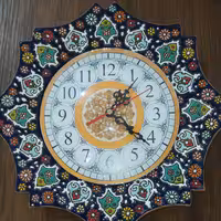 ساعت دیواری میناکاری شده.زمینه سرمه ای.قطر 30 سانتی متر