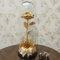 گل رز طلایی تک شاخه با باکس شیشه ای (پس کرایه)