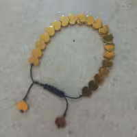 دستبند حدید با بند مکرومه و گره کشوی مناسب برای دختران وبانوان