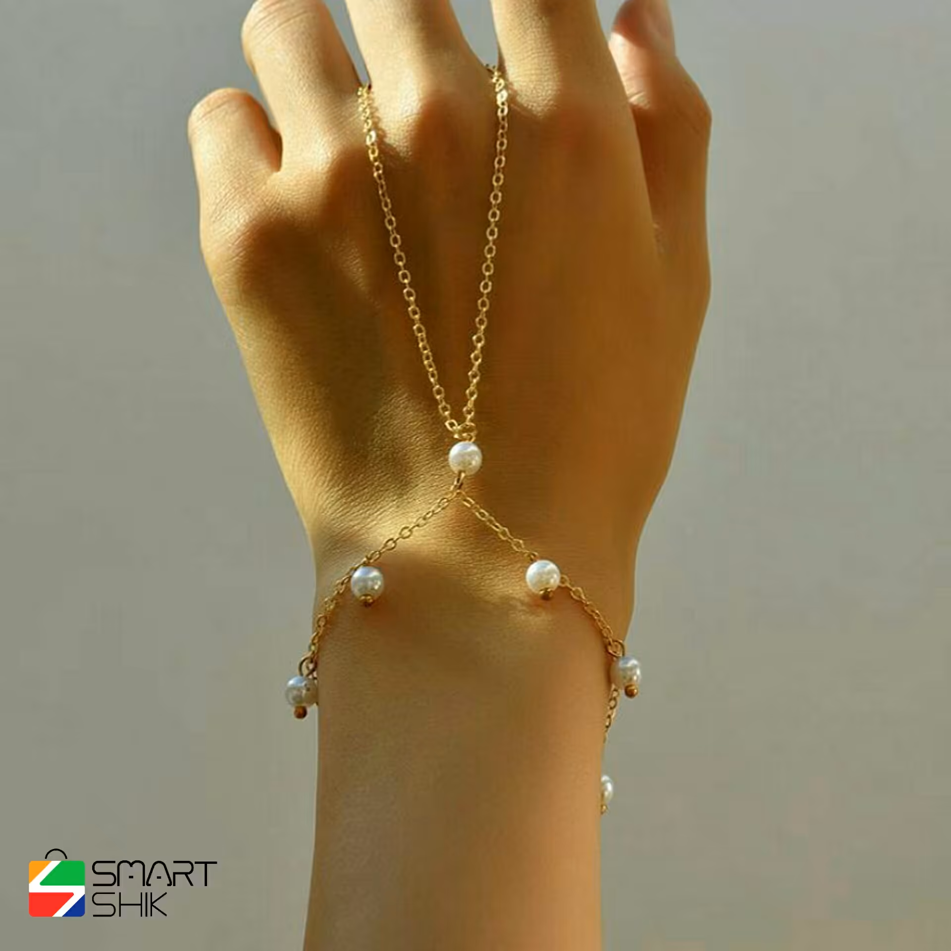 تمیمه دست استیل و رنگ ثابت دارای آویز های مرواریدی