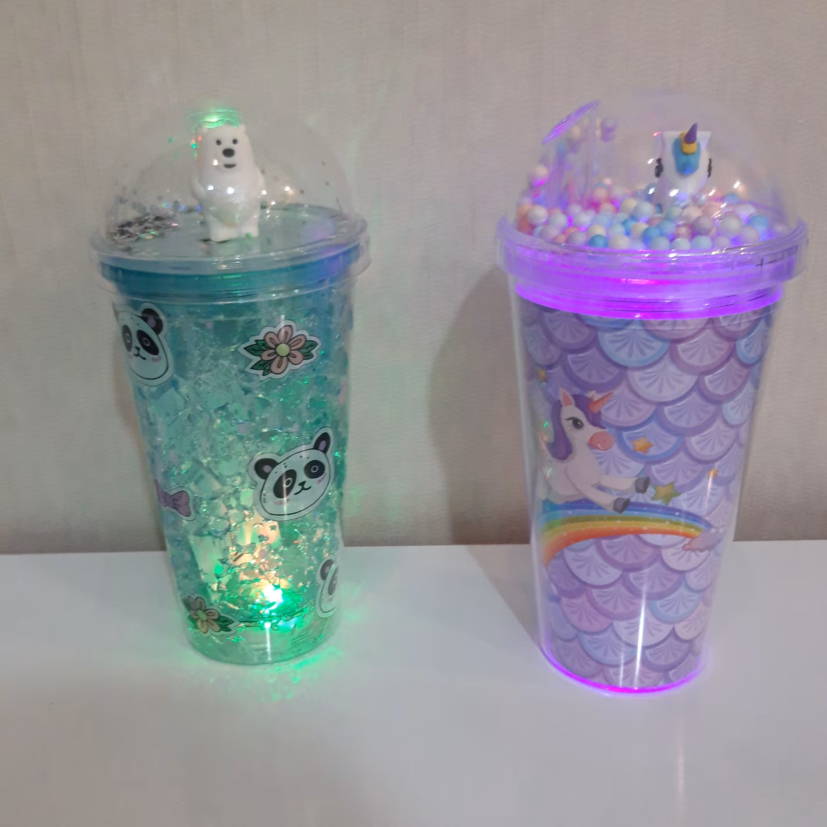 ماگ چراغ دار  3رنگ و 3 حالت رقص نور  تک جداره و 2 جداره در نقش های شاد کودکانه