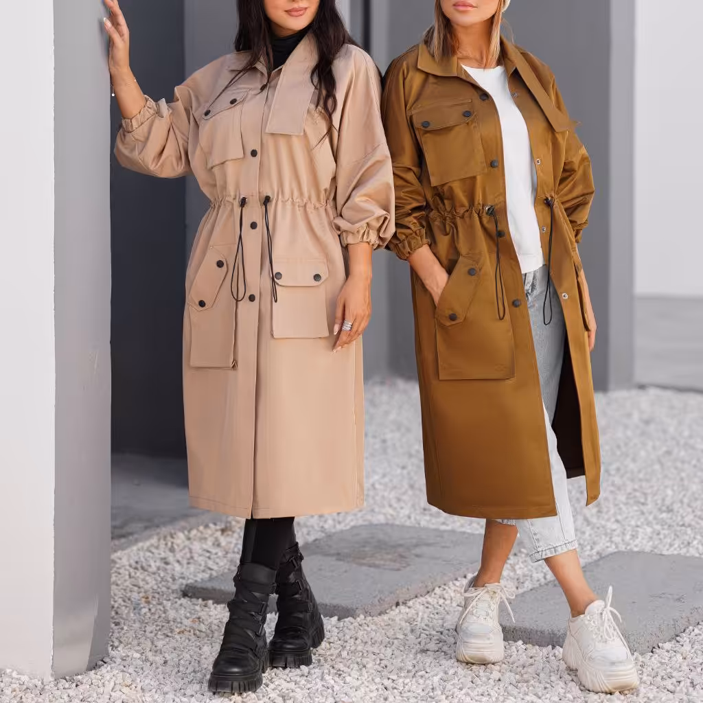 بارونی زنانه بلند مدل 3جیب پاکتی کمر  گتر جنس تی سی ضدآب درجه یک مشکی،طوسی،کرم،قهوه ای،آجری،سرمه ای