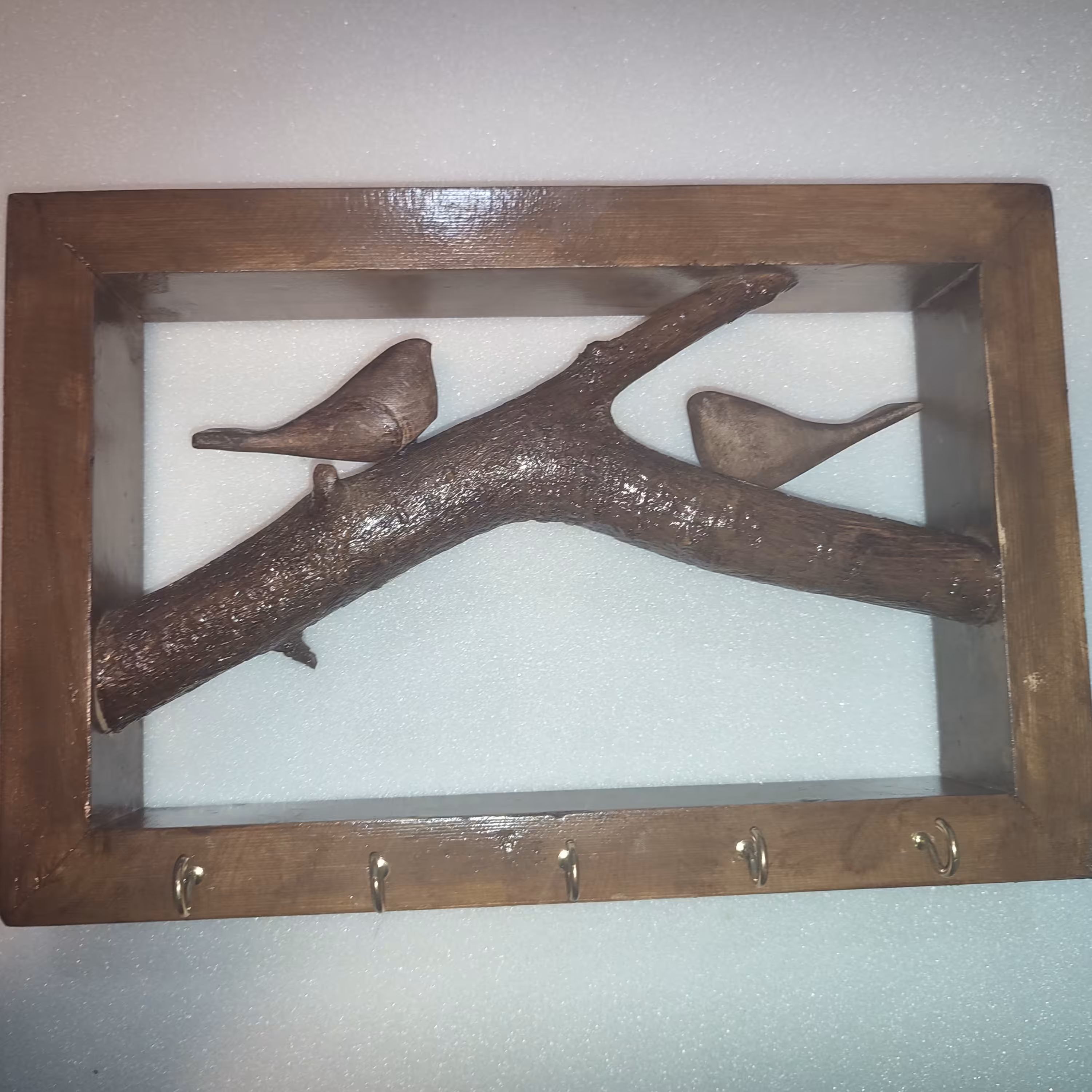 جا کلیدی چوبی. پرنده چوبی (پس کرایه)