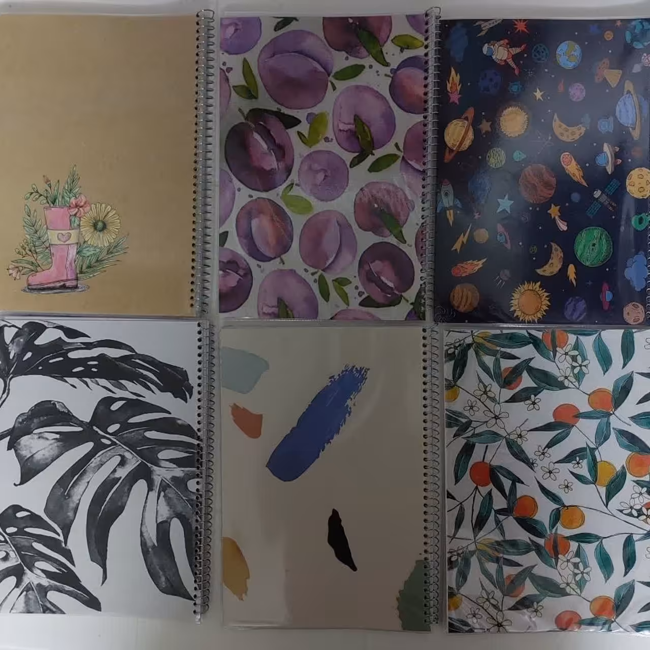 دفتر 50 برگ تک خط فنری جلد شده طرح کلاسیک آراز بیکران آساناپخش 

