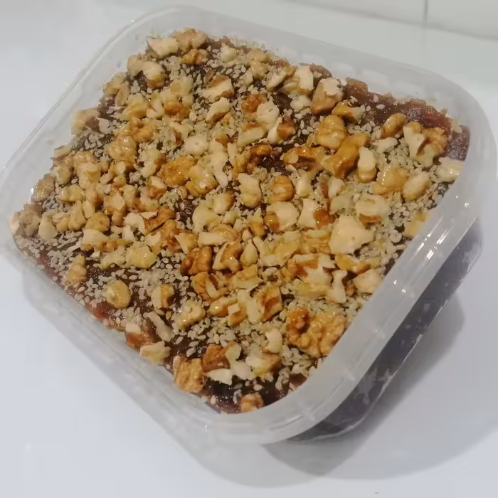 حلوا خرمایی بوشهری با مغز گردو و کنجد  تازه و تمیز درجه 1 محصولی فوق العاده عالی 