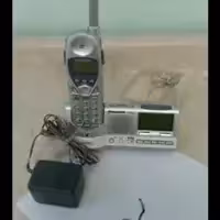 ساعت  رومیزی همراه بارادیو وپایه شارژر گوشی پاناسونیک