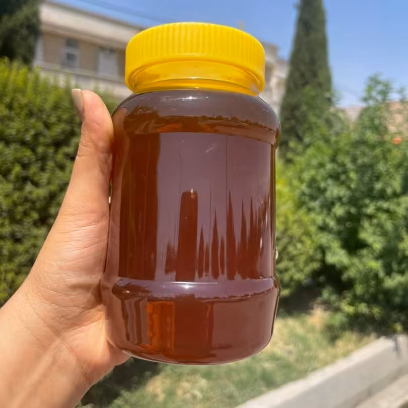 عسل چهل گیاه خالص و طبیعی با عطر گل های طبیعی مستقیم از کندو دار خرید کنید 