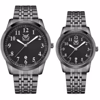 ست ساعت مچی عقربه ای زنانه و مردانه اوبلاک مدل 72708 رنگ تیتان صفحه مشکی
