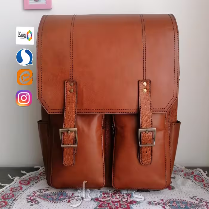 کیف لپ تاپ چرم طبیعی ، قابل استفاده به عنوان کوله مسافرتی . کار جذاب و دارای دو جای مجزا جای لپ تاپ