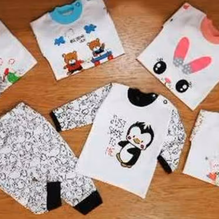 ست بلوز و شلوار نوزاد طرح پنگوئن سورمه ای 